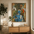 "Divine Melody" painting of Krishna playing flute, hung above a wooden console with plants.