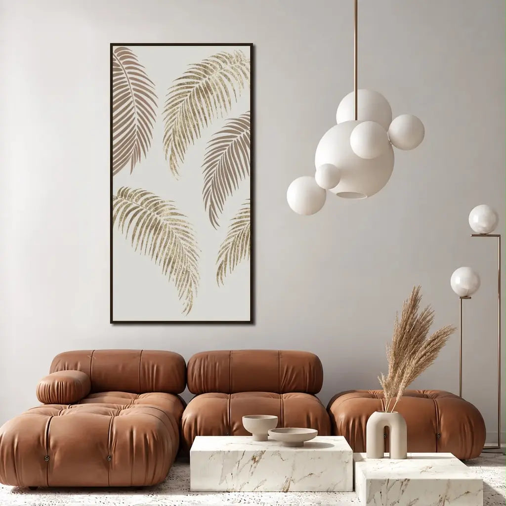 Coastal Calm palm leaf canvas wall art above a brown sofa