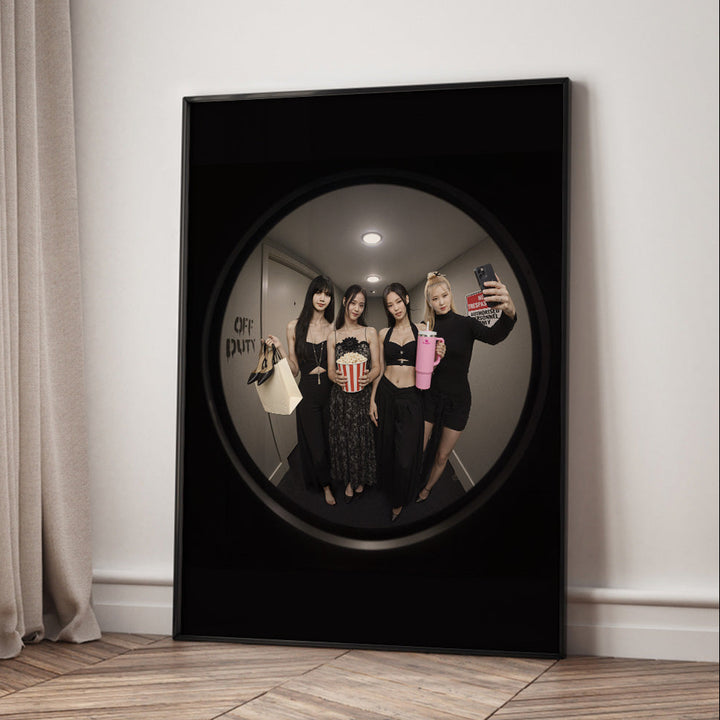 Framed doorknob with a view of BLACKPINK band posing indoors.