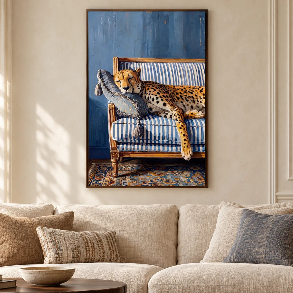 Prince at Rest cheetah canvas in a walnut frame above an ivory sofa in a sunlit living room